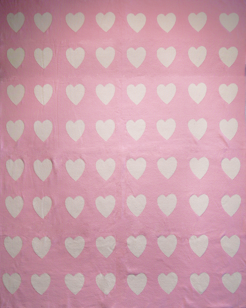 Manta corazón rosado